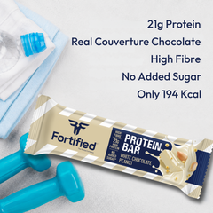 (White Chocolate Peanut) Fortified protein bar with white chocolate peanut flavor, shown with a bottle and dumbbells on a light gray background.